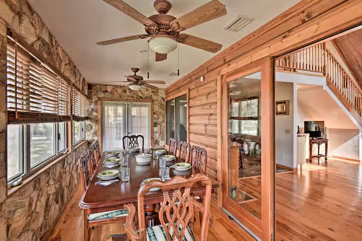 Screened dining porch set for a meal